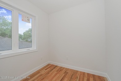 NEW CONSTRUCTION! Beautiful TWO family custom 6 over 6 home - photo 50