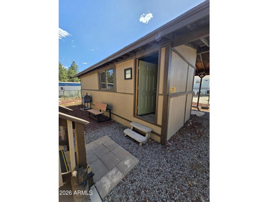 Nestled in the White Mountains of Arizona, Lakeside is a vibrant - photo 33