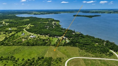Ready Build Site - 1.6 Acres in Gated Lake Subdivision! - photo 1