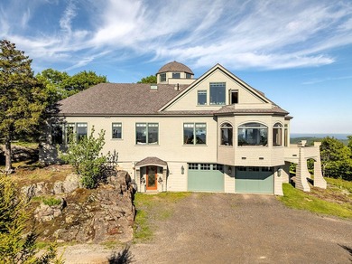 Perched atop Spruce Mountain, this stunning 36-acre estate - photo 2