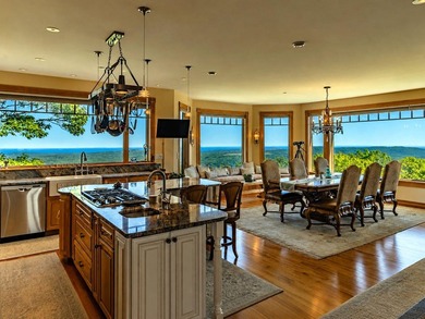 Perched atop Spruce Mountain, this stunning 36-acre estate - photo 6