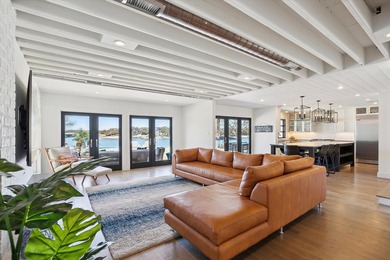 Exceptional waterfront home with contemporary design set against - photo 9