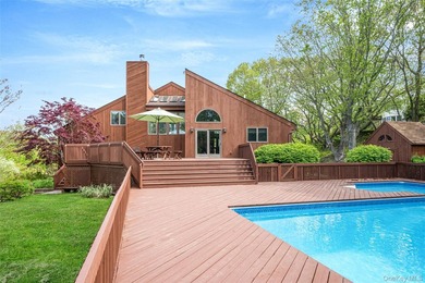 Set within the quiet Rolling Woods neighborhood on a shy acre at - photo 14