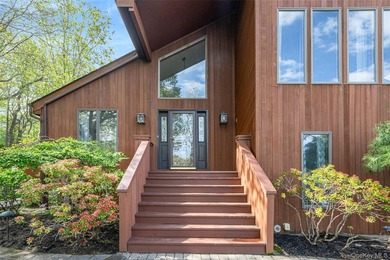 Set within the quiet Rolling Woods neighborhood on a shy acre at - photo 17