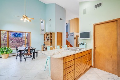 Set within the quiet Rolling Woods neighborhood on a shy acre at - photo 25