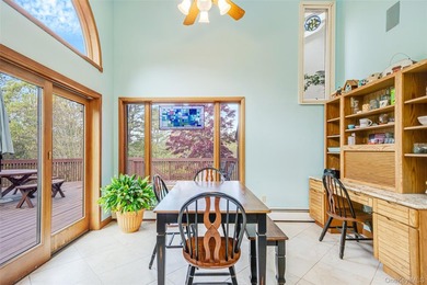 Set within the quiet Rolling Woods neighborhood on a shy acre at - photo 26