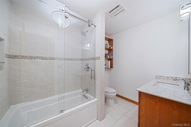 Set within the quiet Rolling Woods neighborhood on a shy acre at - photo 29