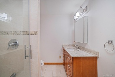 Set within the quiet Rolling Woods neighborhood on a shy acre at - photo 30
