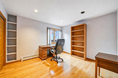 Set within the quiet Rolling Woods neighborhood on a shy acre at - photo 31