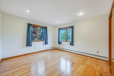 Set within the quiet Rolling Woods neighborhood on a shy acre at - photo 35