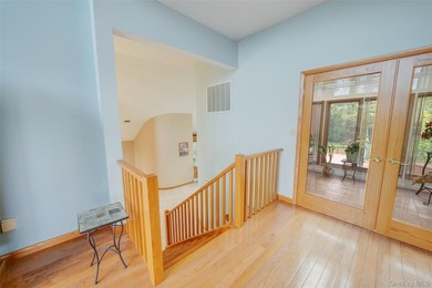 Set within the quiet Rolling Woods neighborhood on a shy acre at - photo 39