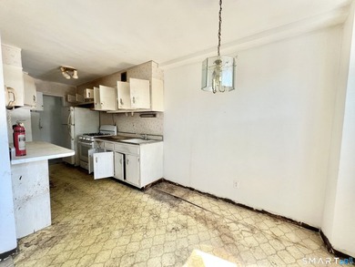 A rare renovation opportunity offering accessible entry into one - photo 8