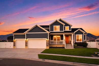Beautifully maintained two-story home in Stansbury Park offering - photo 1