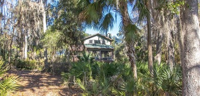 Privately nestled on 2.26 acres with approximately 150 ft of - photo 40