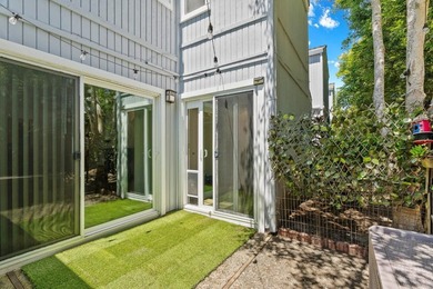 Tucked within a quiet Live Oak townhome community, this - photo 13