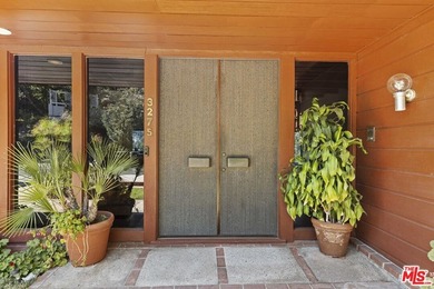 Built in 1980, this architectural gem showcases many of the - photo 5