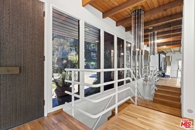 Built in 1980, this architectural gem showcases many of the - photo 8