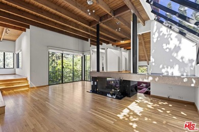 Built in 1980, this architectural gem showcases many of the - photo 10