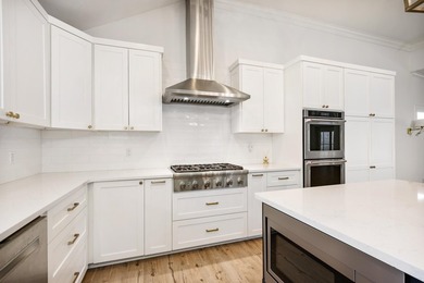 Don't miss out on this beautifully renovated home on open water - photo 11