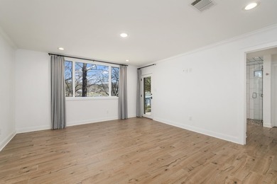 Don't miss out on this beautifully renovated home on open water - photo 12
