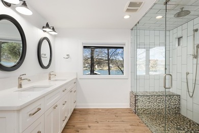 Don't miss out on this beautifully renovated home on open water - photo 14
