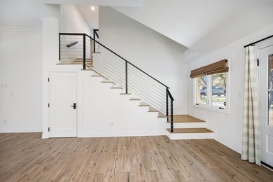 Don't miss out on this beautifully renovated home on open water - photo 16