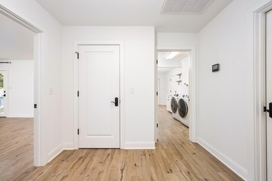 Don't miss out on this beautifully renovated home on open water - photo 25