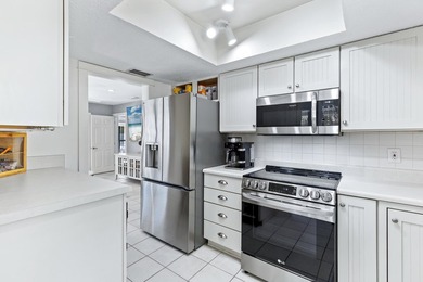 Nestled on the pond in the sought-after Fairways community of