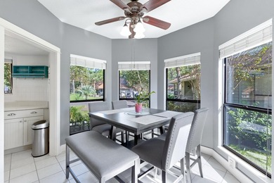 Nestled on the pond in the sought-after Fairways community of