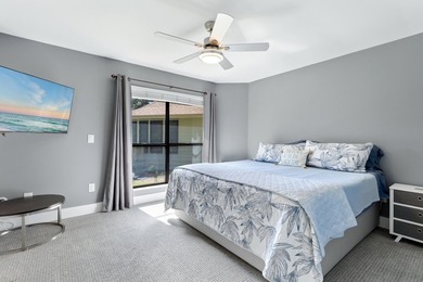 Nestled on the pond in the sought-after Fairways community of