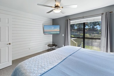 Nestled on the pond in the sought-after Fairways community of