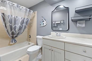 Nestled on the pond in the sought-after Fairways community of