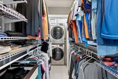 Nestled on the pond in the sought-after Fairways community of