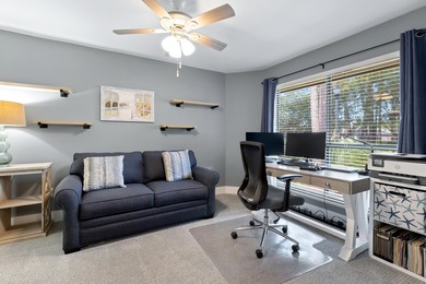 Nestled on the pond in the sought-after Fairways community of