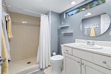 Nestled on the pond in the sought-after Fairways community of