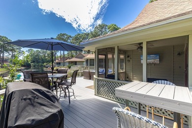 Nestled on the pond in the sought-after Fairways community of