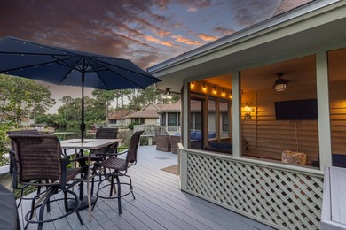 Nestled on the pond in the sought-after Fairways community of