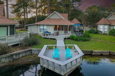 Nestled on the pond in the sought-after Fairways community of