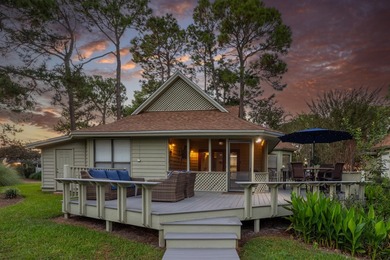 Nestled on the pond in the sought-after Fairways community of