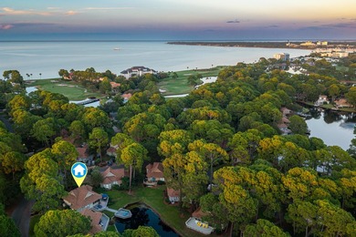 Nestled on the pond in the sought-after Fairways community of