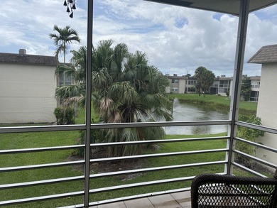 Private 2nd floor location end unit location overlooking pond w/ - photo 1