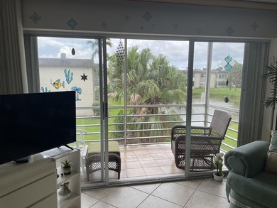 Private 2nd floor location end unit location overlooking pond w/ - photo 2