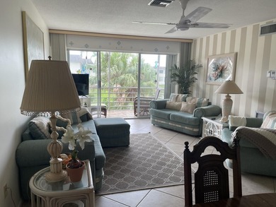 Private 2nd floor location end unit location overlooking pond w/ - photo 3