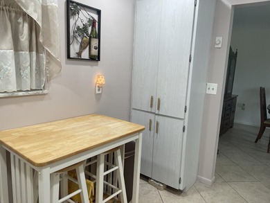 Private 2nd floor location end unit location overlooking pond w/ - photo 5