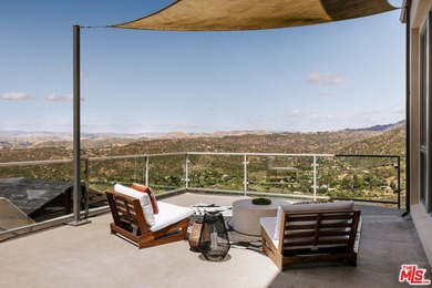 Perched on a private promontory deep within the Santa Monica - photo 17