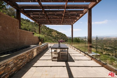 Perched on a private promontory deep within the Santa Monica - photo 20