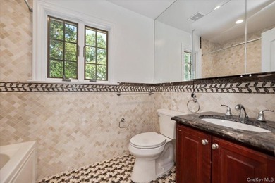 Welcome to this Harbor Hills gem - a beautifully renovated - photo 22