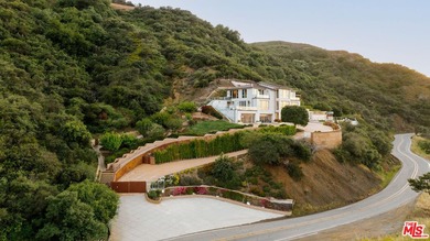 Perched on a private promontory deep within the Santa Monica - photo 23