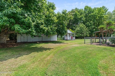 Nestled on nearly an acre in the established Pinewood community - photo 34