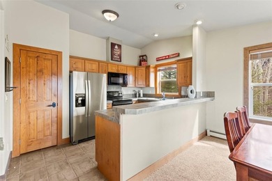 Tucked into Summit Cove in Dillon, this 3-bed, 2.5 bath duplex - photo 8